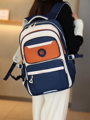 Ученическа раница: лека, водоустойчива, оксфорд плат, голям обем, презрамки с въздушна възглавница