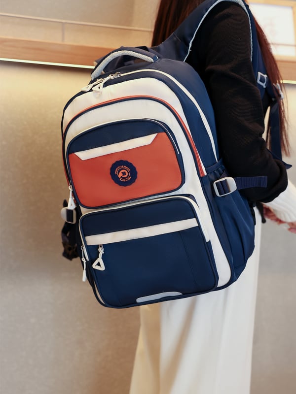 Ученическа раница: лека, водоустойчива, оксфорд плат, голям обем, презрамки с въздушна възглавница