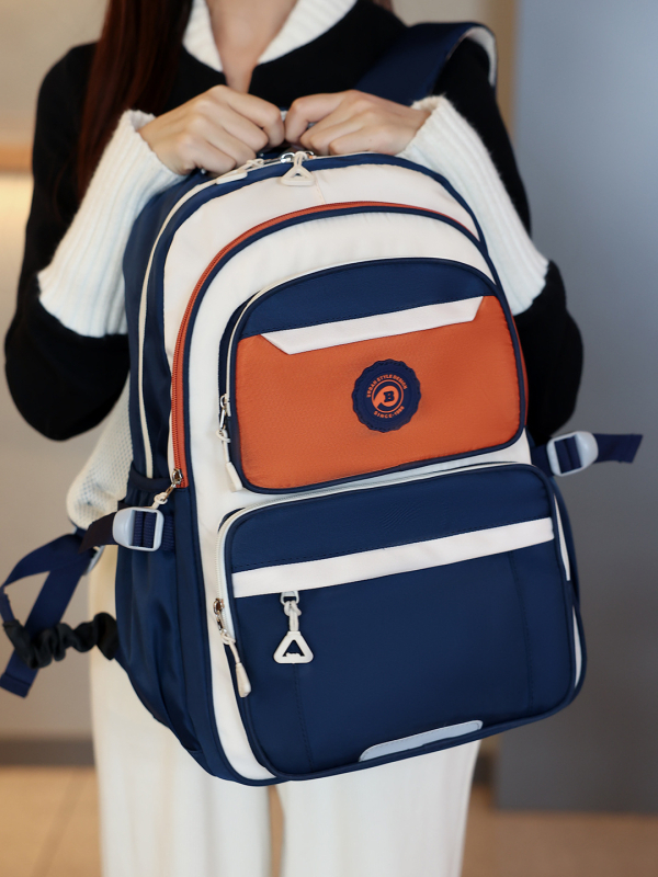 Ученическа раница: лека, водоустойчива, оксфорд плат, голям обем, презрамки с въздушна възглавница