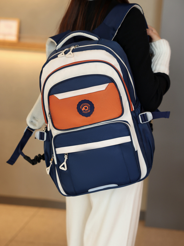 Ученическа раница: лека, водоустойчива, оксфорд плат, голям обем, презрамки с въздушна възглавница