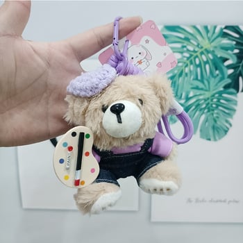 Плюшено мече‑кукла със закачалка и пуловер (къс плюш, PP памук пълнеж, опаковка в мрежеста торба)