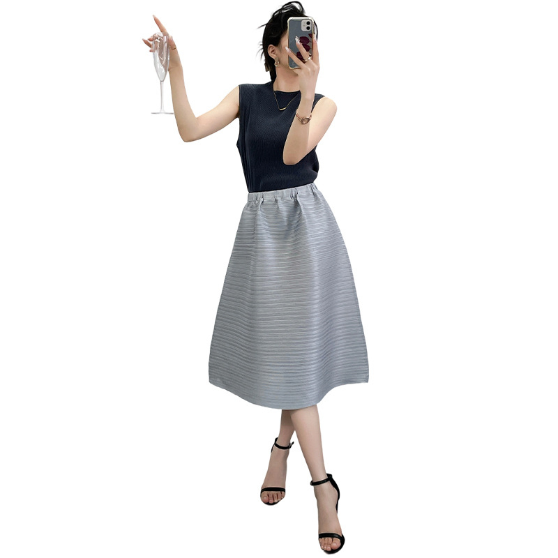 Miyake stil plisirana midi suknja za žene, slobodan kroj, jednobojna, elastičan pojas, A-linija
