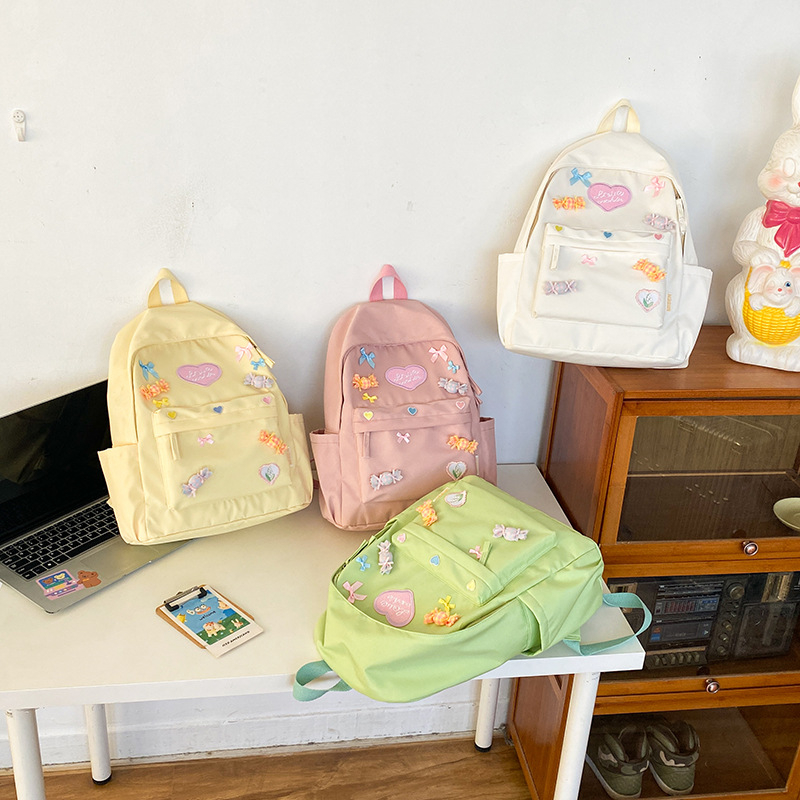 Ženski školski ruksak od najlona, svjež i sladak stil; kapacitet 20–35 L; pogodan za 8-inčni laptop; podstava od poliestera; zakrivljene naramenice.