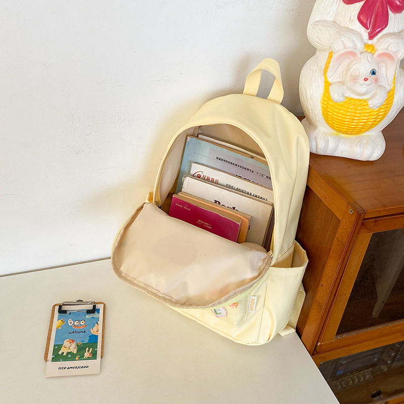 Ženski školski ruksak od najlona, svjež i sladak stil; kapacitet 20–35 L; pogodan za 8-inčni laptop; podstava od poliestera; zakrivljene naramenice.