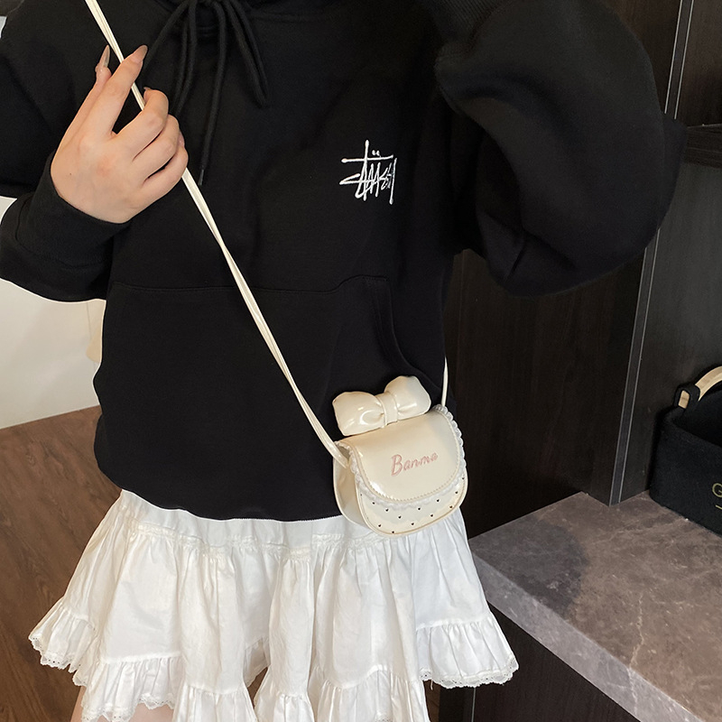 Dječja crossbody torba od PU materijala, uzor mašnica, podstava od poliestera, prozračna