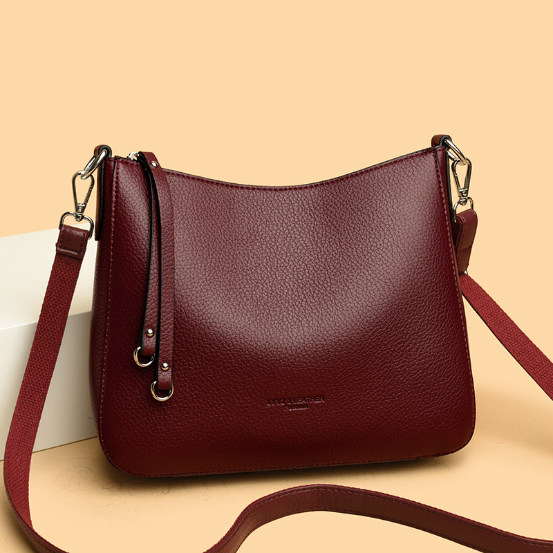 Crossbody torba od prave kože, gradski jednostavan stil, vodoravni kvadratni oblik, zatvaranje na zip, džep za telefon