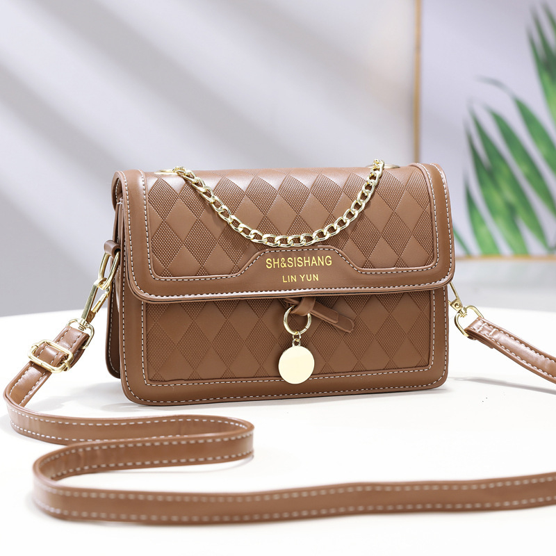 Crossbody torba od PVC materijala, horizontalni kvadratni oblik, zatvaranje na zip, Orange Beans.