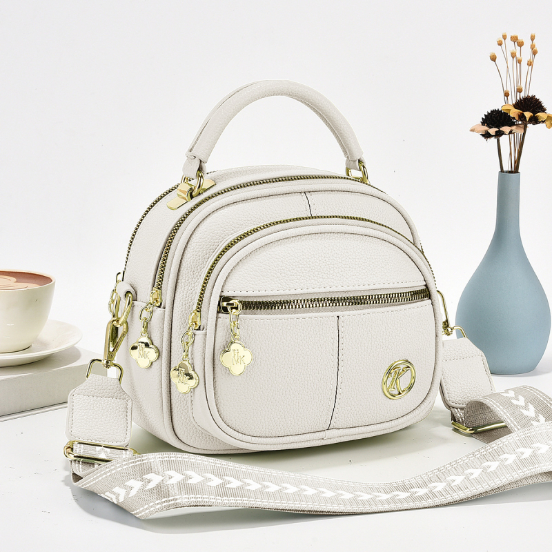 PU ženska crossbody torba s kutijskim oblikom, zatvarač, poliester podstava, laminirani unutarnji džep, jedna naramenica