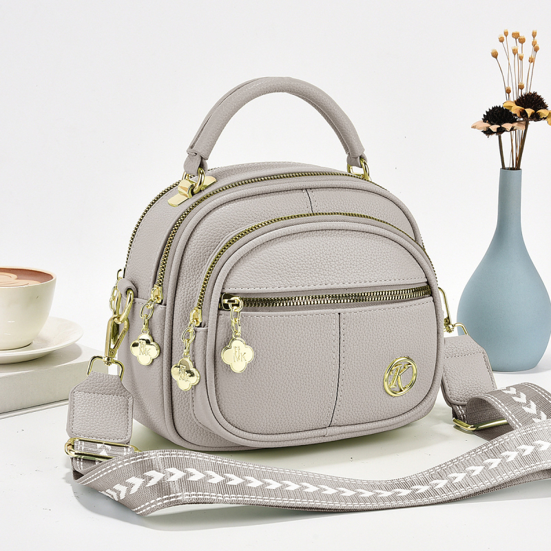 PU ženska crossbody torba s kutijskim oblikom, zatvarač, poliester podstava, laminirani unutarnji džep, jedna naramenica