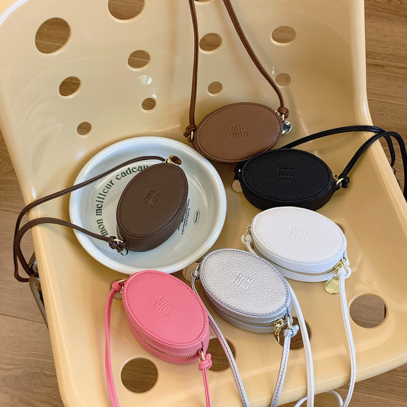 Mini crossbody torbica za djevojčice (PU materijal, ultra lagana, zaštita kralježnice, podstava od poliestera)