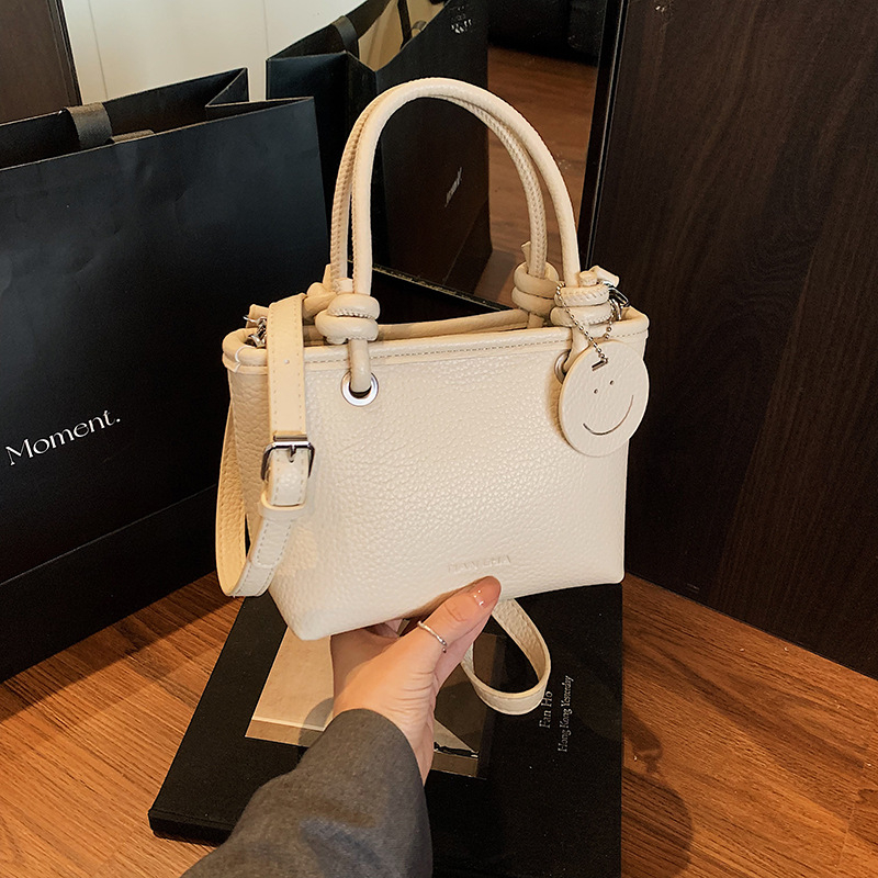 Női Shell Bucket táska – PU bőr, kopásálló, poliészter bélés, egyszínű, keresztpántos kivitel