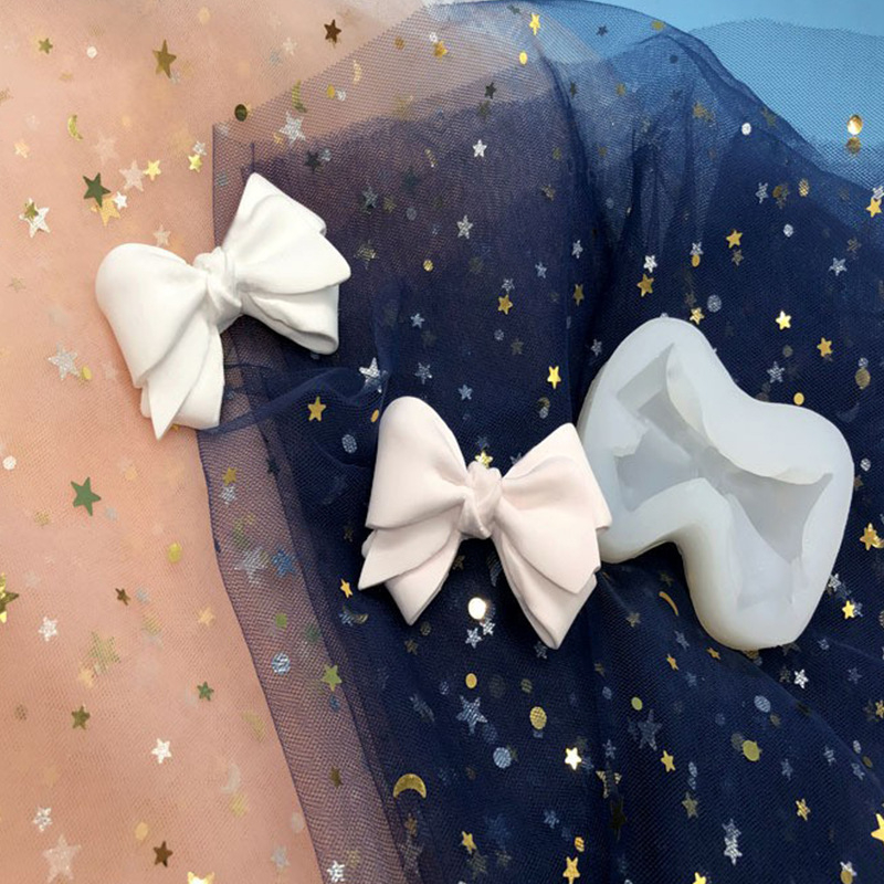 Силиконова формичка под формата на панделка за фондант и декорация на торти | Марка Jiujiu Renshan; Материал: силикон; Категория: форми за торти; Приложение: фондант, захарни декорации, шоколад, ароматни свещи, автомобилни украси