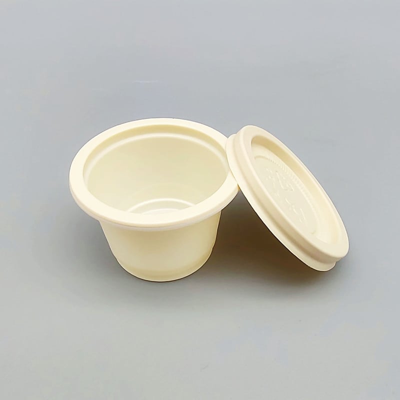 Екологично биоразградими еднократни чаши за сосове със запечатан капак, подходящи за микровълнова печка, от царевично нишесте