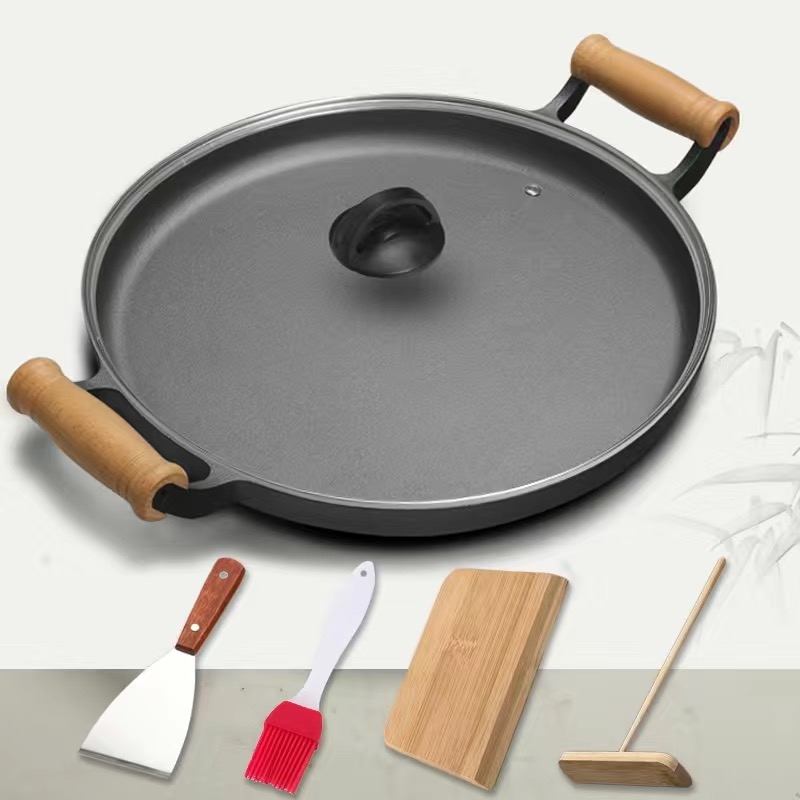 Tigaie din fontă pentru clătite, cu mâner din lemn cu două urechi și capac de sticlă, acoperire antiaderentă, adâncime 4 cm, compatibil cu gaz și inducție