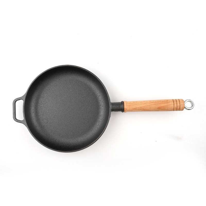 Tava od lijevanog željeza s ravnim dnom i drvenom drškom, bez premaza, za jaja, palačinke i steak