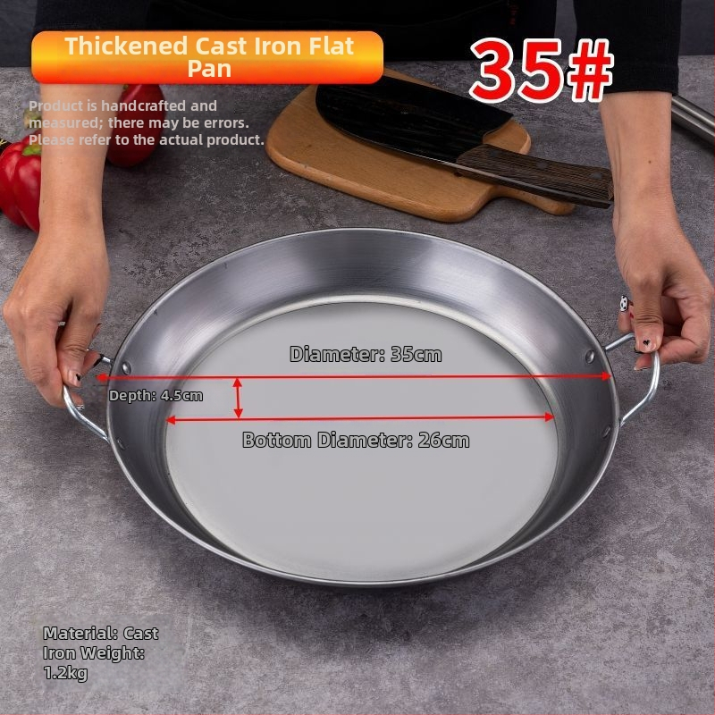 Kétfülű vas palacsinta serpenyő bevonat nélkül, sík aljzattal, mélység 5,2 cm, tömeg 2–3 kg, modellek 35/40/45/50, indukciós és gáztűzhelyhez alkalmas