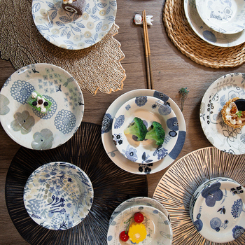 Porcelanska zdjelica s varijantnim podglazurnim uzorcima, okruglog oblika, pogodna za mikrovalnu