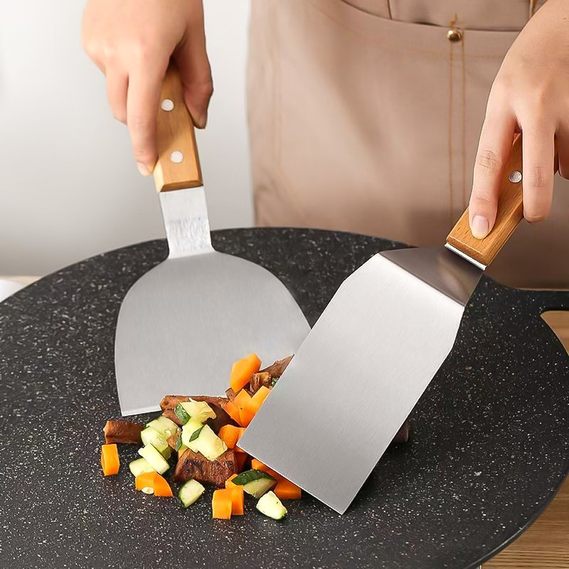 Gu yi špachtla za prženje od nehrđajućeg čelika s drvenom držačem – Teppanyaki stil, kuhinjska špachtla, mogućnost tiskanja logotipa