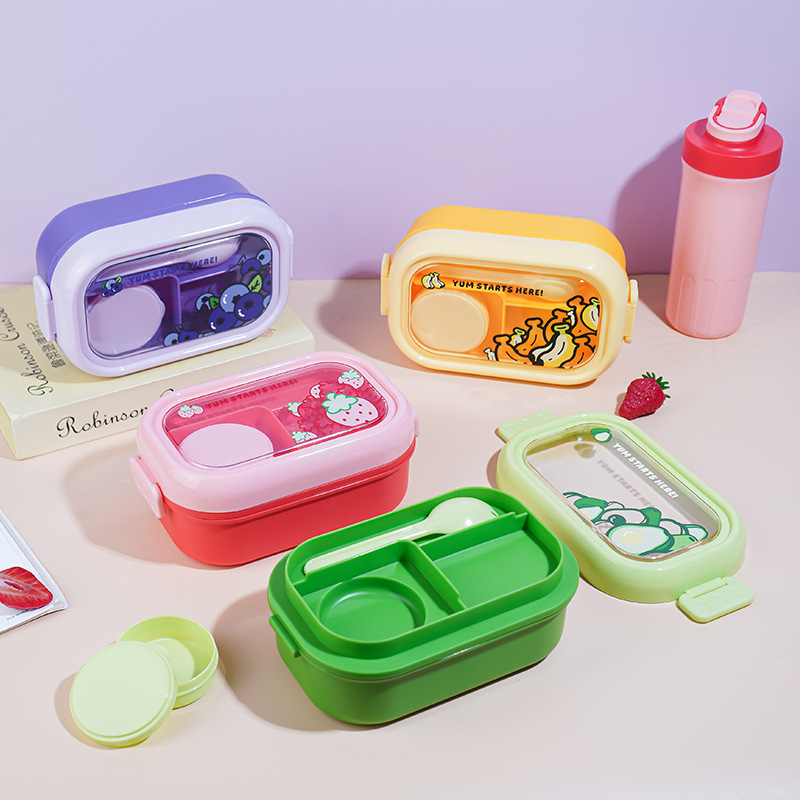 Gyerekeknek készült ebédes doboz rajzolt gyümölcs motívummal, műanyag, ovális alak, 501-800 ml, mikrohullámú sütőben használható, melegen tartja