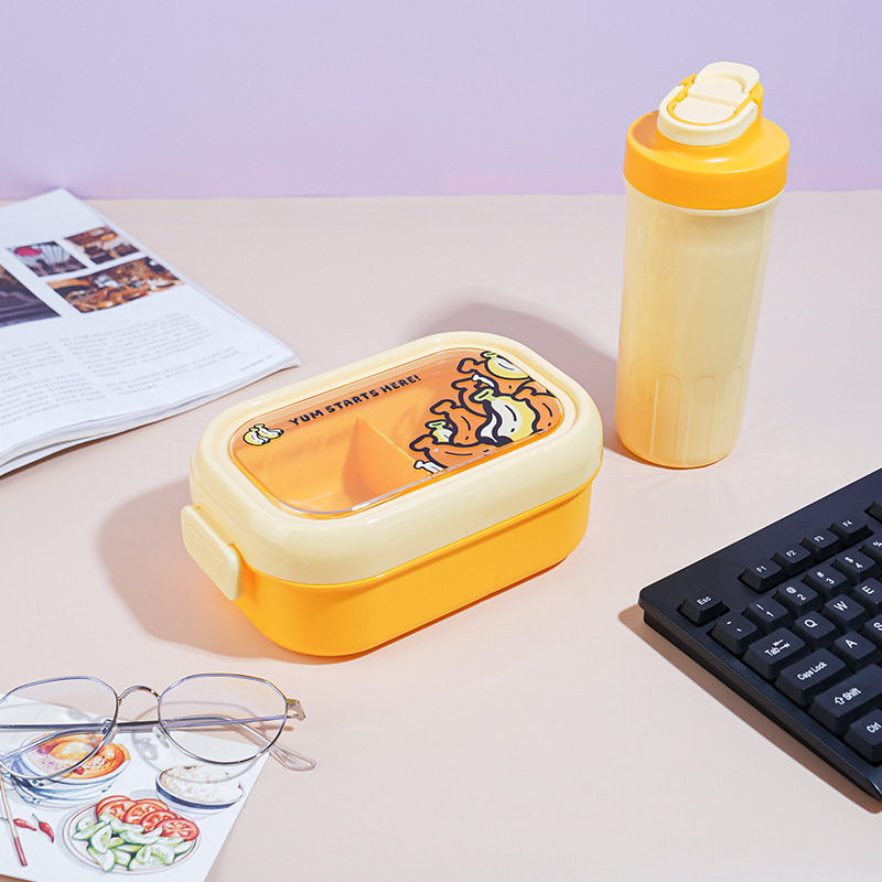 Gyerekeknek készült ebédes doboz rajzolt gyümölcs motívummal, műanyag, ovális alak, 501-800 ml, mikrohullámú sütőben használható, melegen tartja