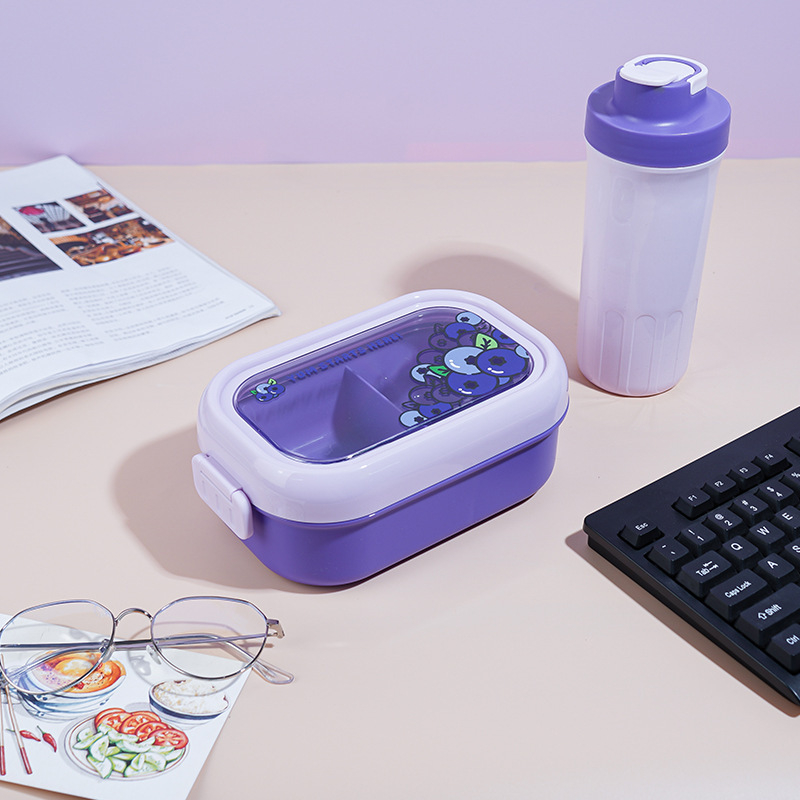 Gyerekeknek készült ebédes doboz rajzolt gyümölcs motívummal, műanyag, ovális alak, 501-800 ml, mikrohullámú sütőben használható, melegen tartja