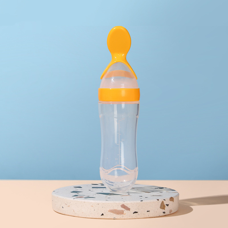 Sticlă de hrănire pentru terci de orez la bebeluși – din silicon, cu încărcător de stoarcere și lingură minimalistă; Brand: New Starting Point; Material: Silicon; Vârstă: 6 luni+