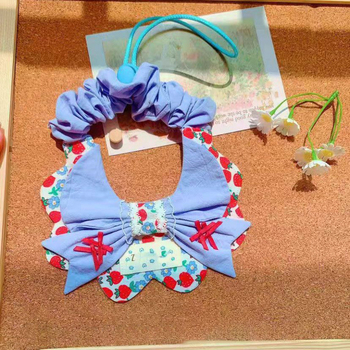 Rugalmasan állítható háromszög alakú bandana macskáknak és kutyáknak
