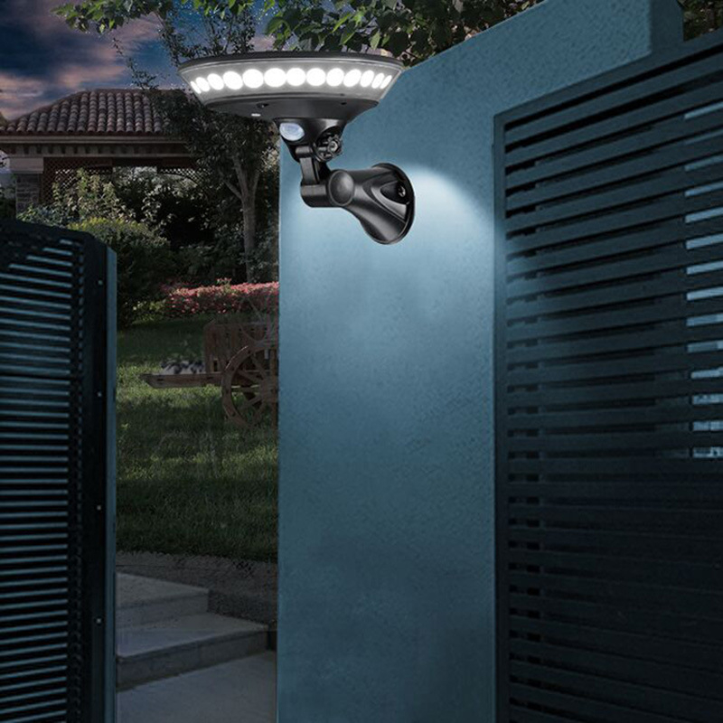 Solarna zidna lampa za dvorište s 360° osvjetljenjem; model UFO, IP65, LED, 3,7 V, 2 W, trajanje 12–16 sati