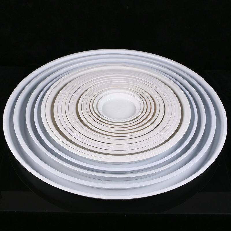 Кръгла пластмасова подложка за саксия с плосък ръб — инжекционно формована, издръжлива, водоспестяваща; за настолна и подова употреба; подходяща за саксии и сукуленти.