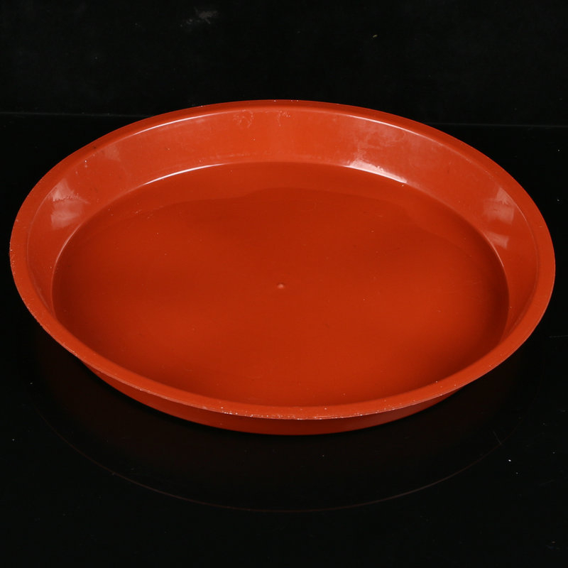 Кръгла пластмасова подложка за саксия с плосък ръб — инжекционно формована, издръжлива, водоспестяваща; за настолна и подова употреба; подходяща за саксии и сукуленти.