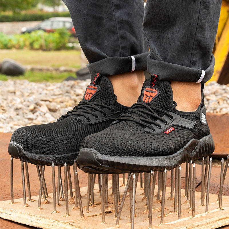 Pantofi de lucru cu vârf de oțel, ușori și confortabili pentru șantiere, din plasă Flyknit; protecție anti-șoc și anti-penetrare; talpă anti-derapare și rezistentă la uzură; culoare negru