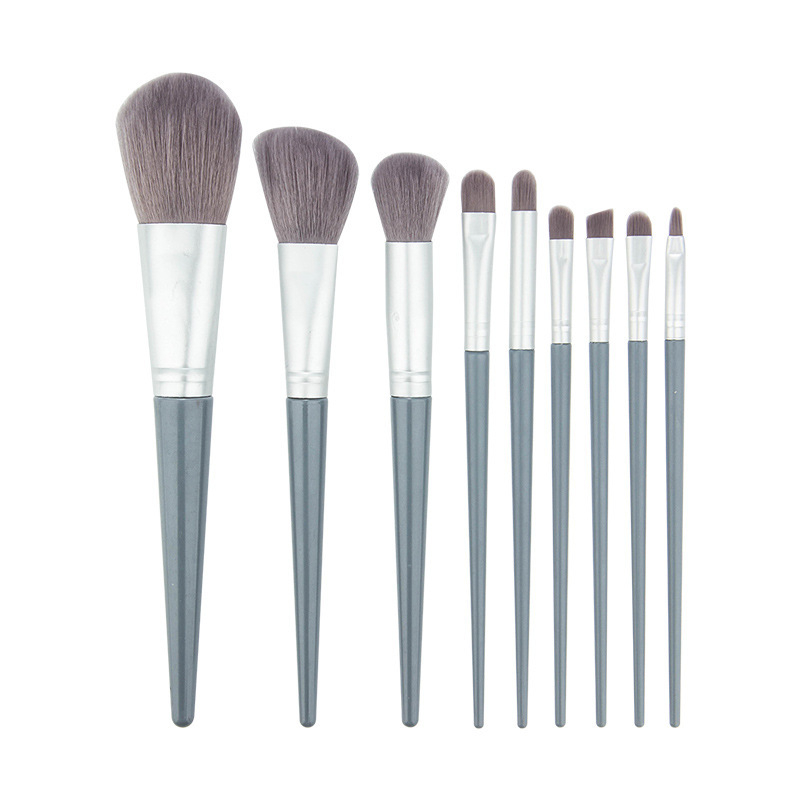 Set de 9 pensule de machiaj, cu peri sintetice, mânere lungi din plastic și husă din plasă