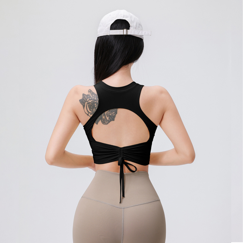 Ženski joga top s umetkom za grudni koš, otvorenim leđima, šnira, materijal najlon/elastan 76,8%/23,2%, ljeto 2025
