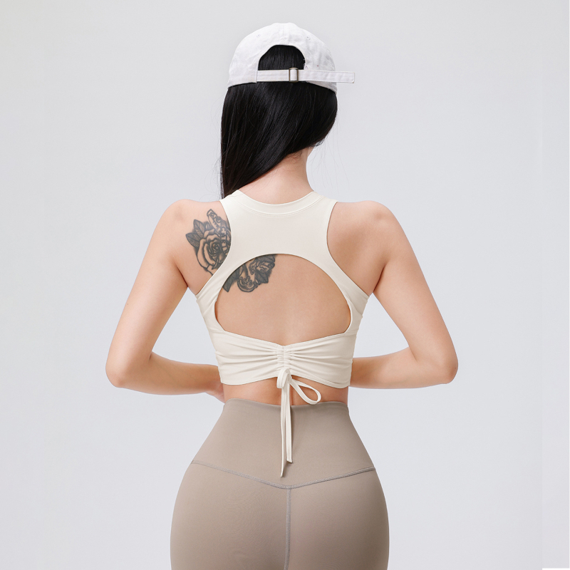 Ženski joga top s umetkom za grudni koš, otvorenim leđima, šnira, materijal najlon/elastan 76,8%/23,2%, ljeto 2025