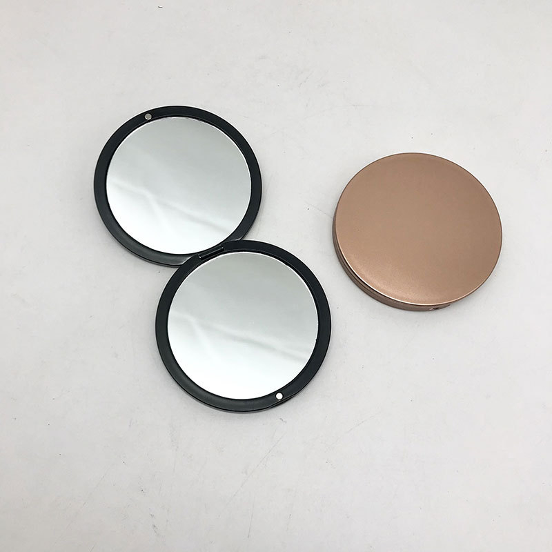 Ajándék tükör, hordozható, összecsukható, (mágneses dupla oldalú, 2x nagyítás, 7,5 cm átmérő)