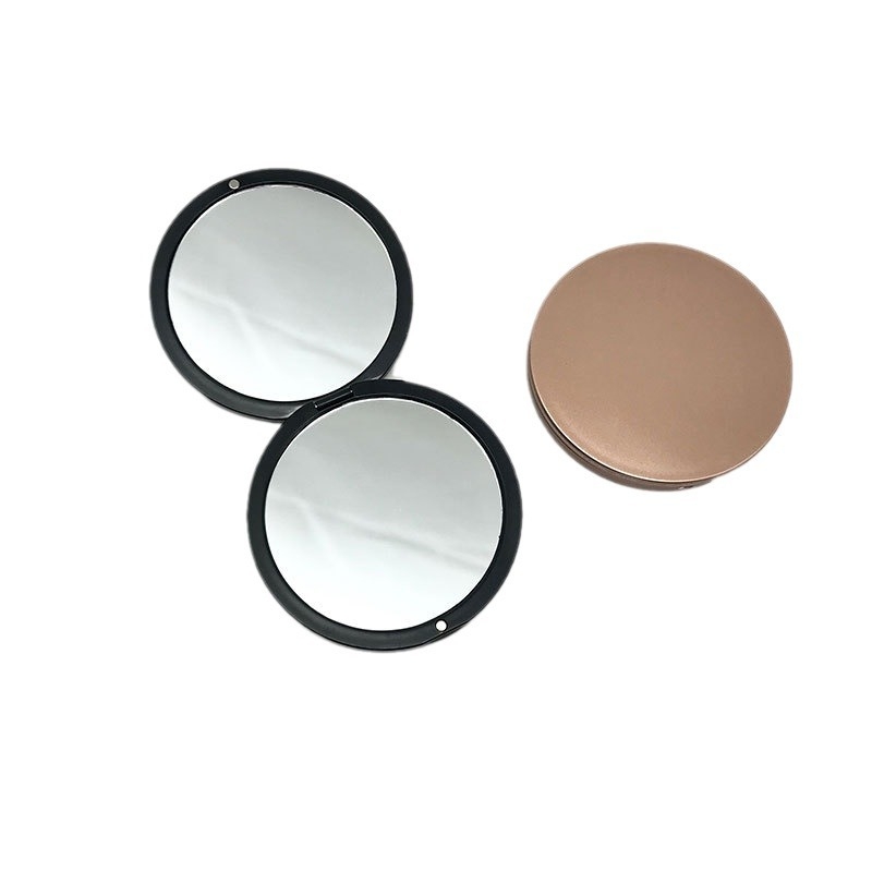 Ajándék tükör, hordozható, összecsukható, (mágneses dupla oldalú, 2x nagyítás, 7,5 cm átmérő)