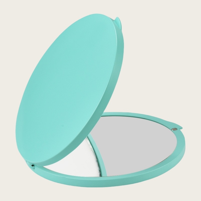 Sklopivo mini okruglo ogledalo za šminku s povećanjem 5x/7x/10x/15x; okvir od ABS-a, staklena leća; sadrži ravno ogledalo i povećalo.