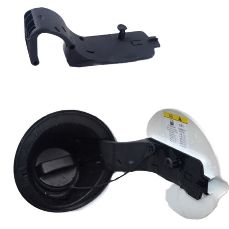 Nosac montaže poklopca spremnika goriva (plastika) – kompatibilno s Ford Focus MK2; dijelovi: 4M51N27936BB, 4M51-N27936-BB, 1376674; modeli: 1376667, 4M51N27936A