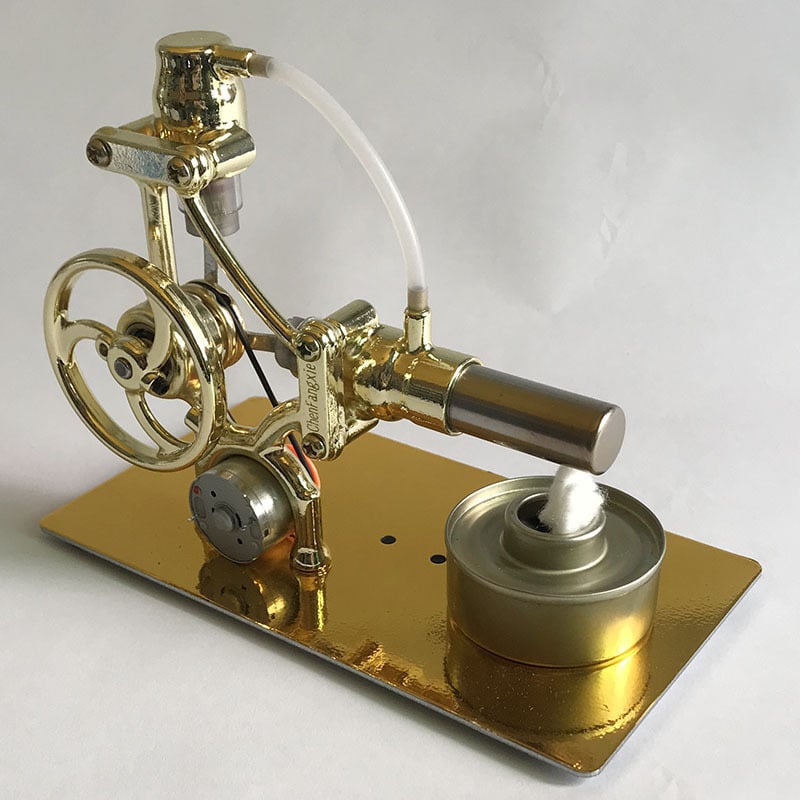 Stirlingi mootori mängumudel, metallkonstruktsiooniga, sobiv 61+ vanusele, hariv aurumasina demonstratsioon