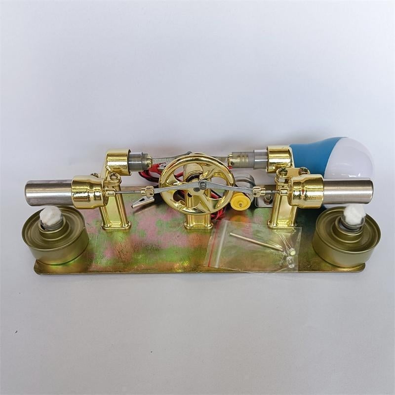 Stirlingi mootori mängumudel, metallkonstruktsiooniga, sobiv 61+ vanusele, hariv aurumasina demonstratsioon