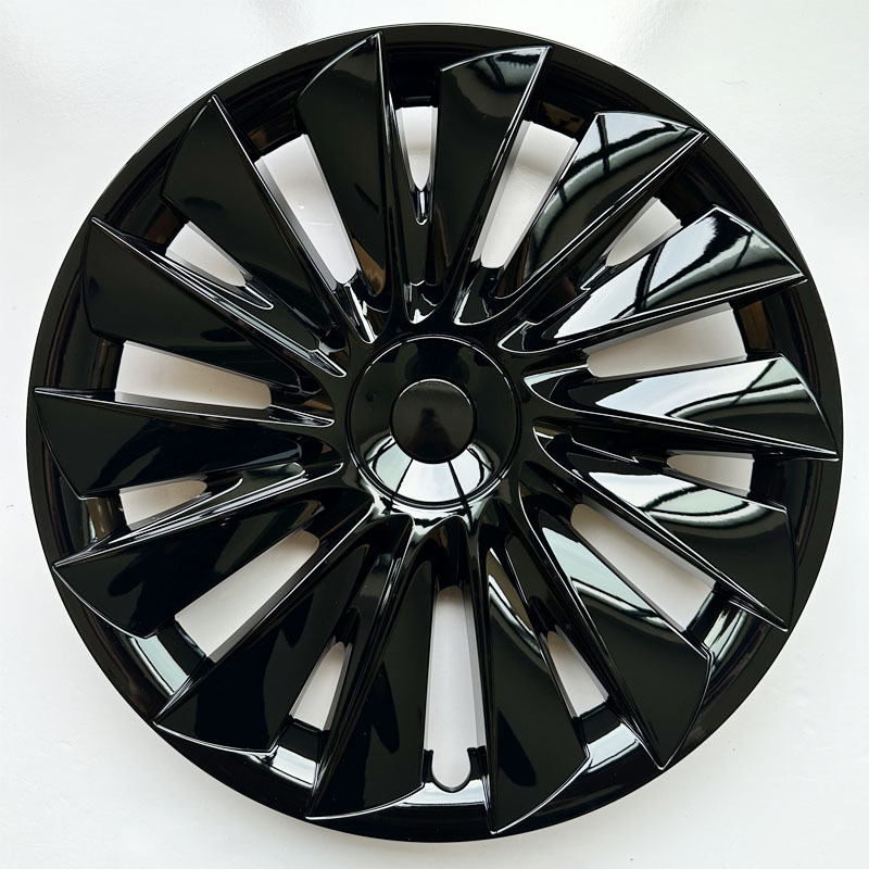 Kryt stredového kola pre Tesla Model Y — Materiál: Plast; Kompatibilné s Tesla Model Y; Značka: Tesla.