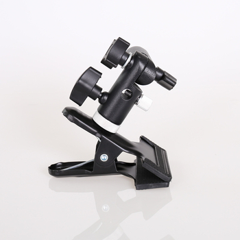 Clema foto multifuncțională cu suport pentru bliț extern, suport pentru umbrelă și clips pentru fundal; construcție din fier și aluminiu.