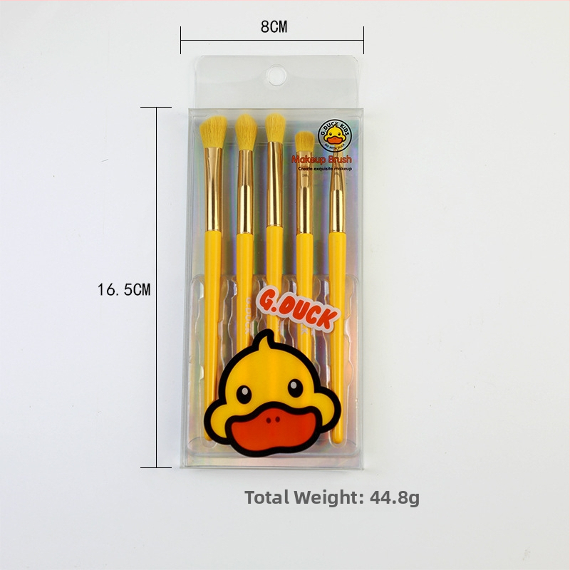 12 darabos kacsás témájú sminkecset-készlet, műszálas sörtékkel, fa fogókkal, teljes hossz 18 cm, sörtéj hossza 5 cm, PVC dobozban