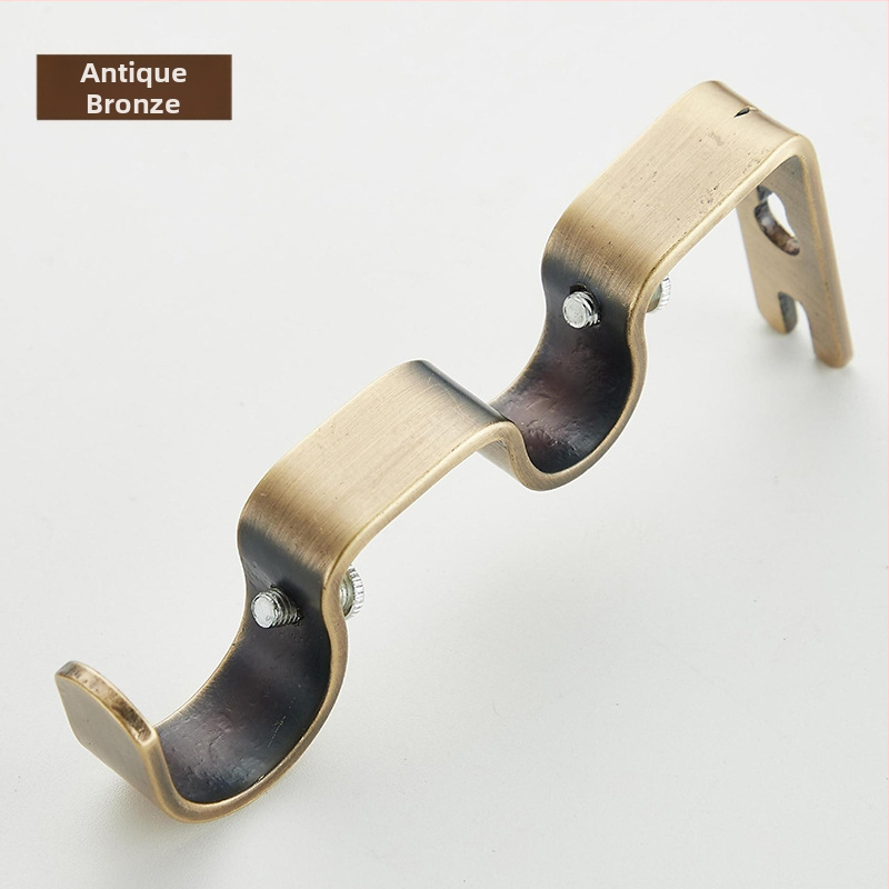 Držiak na závesový rod – dvojito zakrivený, kov, moderný minimalistický štýl, vhodný pre všetky typy závesov