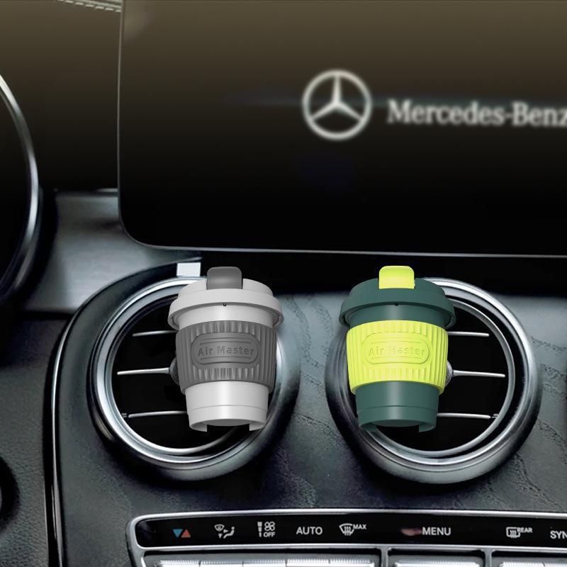 Automobilski difuzor zraka s klipom za izlaz zraka — serija šalice kave, ABS + silikon gel, 10–20 ml, narančasto cvjetni miris, trajanje isparavanja 16–30 dana
