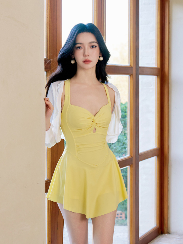 Női egyrészes fürdőruha hosszú ujjú, egységes színű, poliészter-spandex anyag, melltámasz