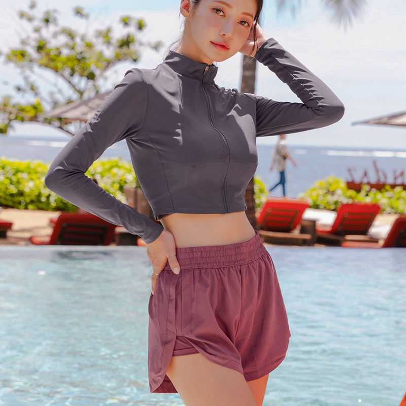 Costum de baie din două părți pentru femei, cu mâneci lungi, pentru înot și snorkel, model solid, cu burete la bust și fără suport metalic; material: nailon, poliester; căptușeală: poliester