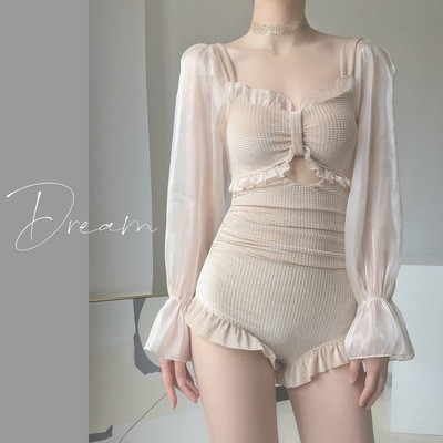 Ženski jednodijelni kupaći kostim s dugim rukavima, jednobojni, bez leđa; umetci za dojke (bez čelične potpore); podstava: Spandex.