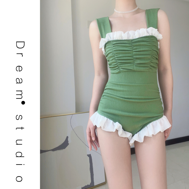 Női egyrészes fürdőruha, magas derék, hasat formázó fazon, egyszínű mintázat, belső melltámasz, poliészter 90–94%