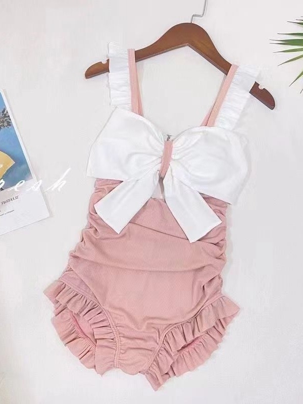 Dječji jednodjelni kupaći kostim za djevojčice uzrasta 4–6 godina, model 63079, Milk Silk tkanina, visoka elastičnost, s otvorenim leđima